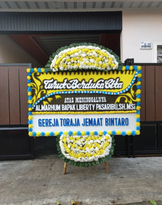 Papan Bunga Duka di Botu